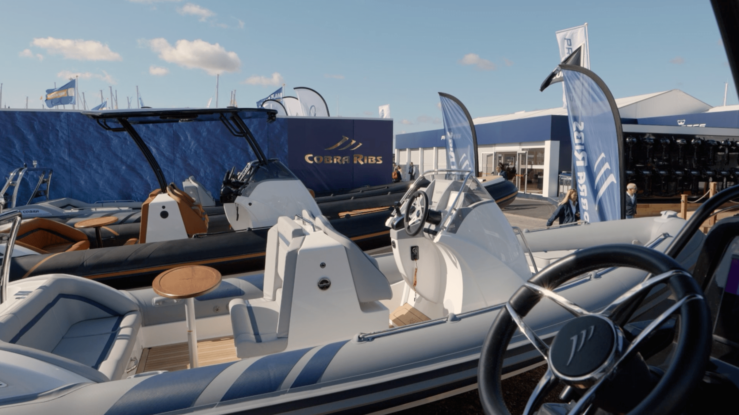 Multiple RIB boats at boat show stand