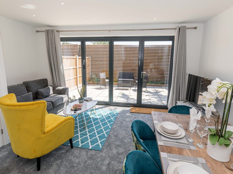 Luxury lounge with folding patio doors to the garden area